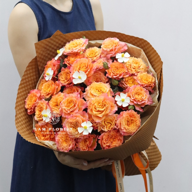 Bó hoa sinh nhật  tone cam dáng tròn